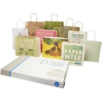 Musterbox mit Tüten aus Kraftpapier und landwirtschaftlichen Reststoffen