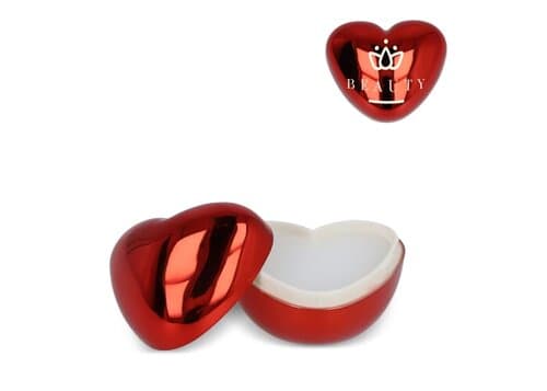 Lippenbalsam in metallischer Herzformdose